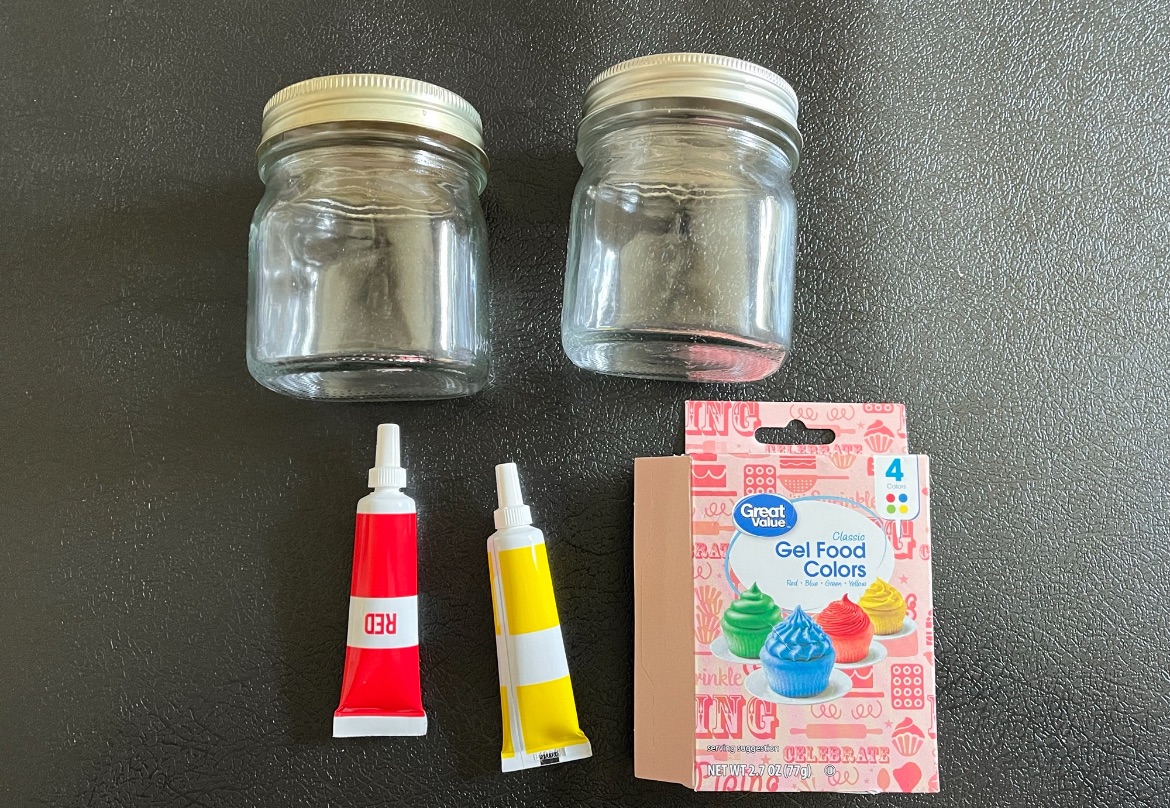 Glass mason jar Jack O Lantern and Candycorn decoration.